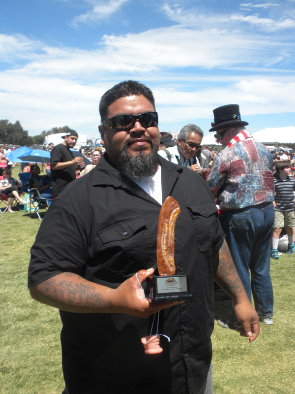 Cruz Reyes from Manteca ate 1lb of bacon in two minutes to win his heat and then ate 1.5lbs in three minutes to win Baconfest’s 2016 Amateur Bacon Eating Contest. 